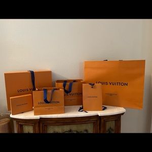 Louis Vuitton bags and boxes with ribbon